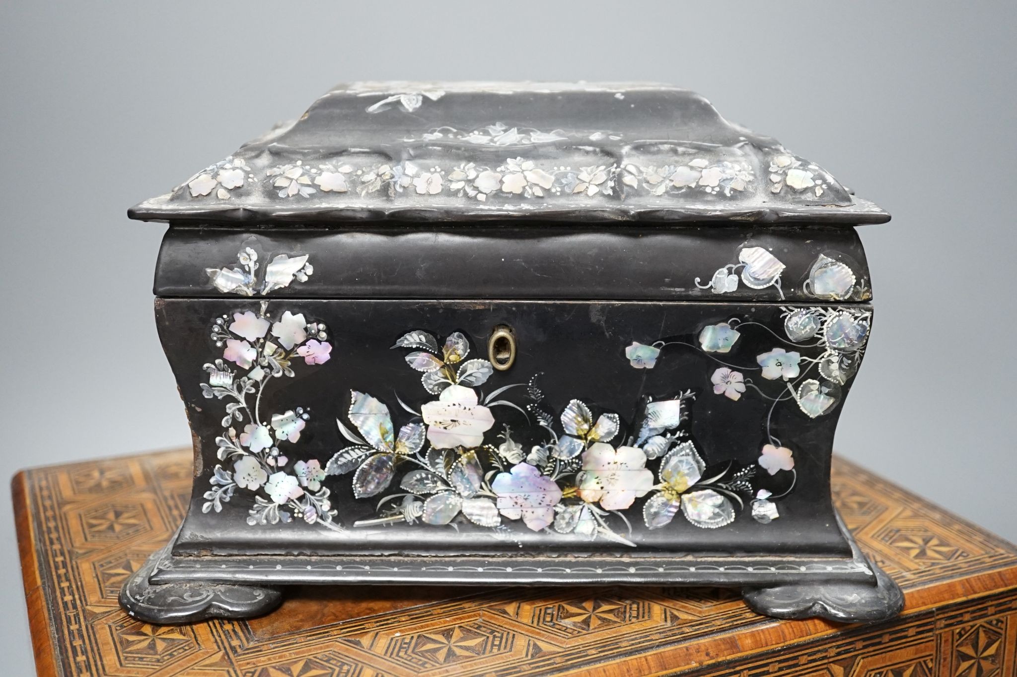 A Victorian inlaid walnut box and a Victorian black lacquer tea caddy, 30cm